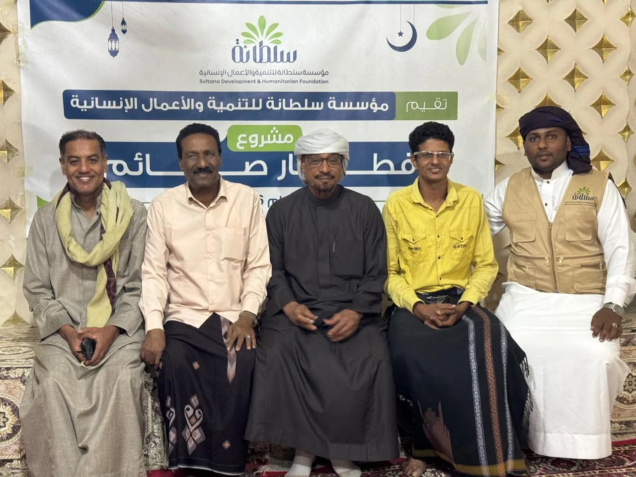 توزيع التمور والملابس وإفطار صائم