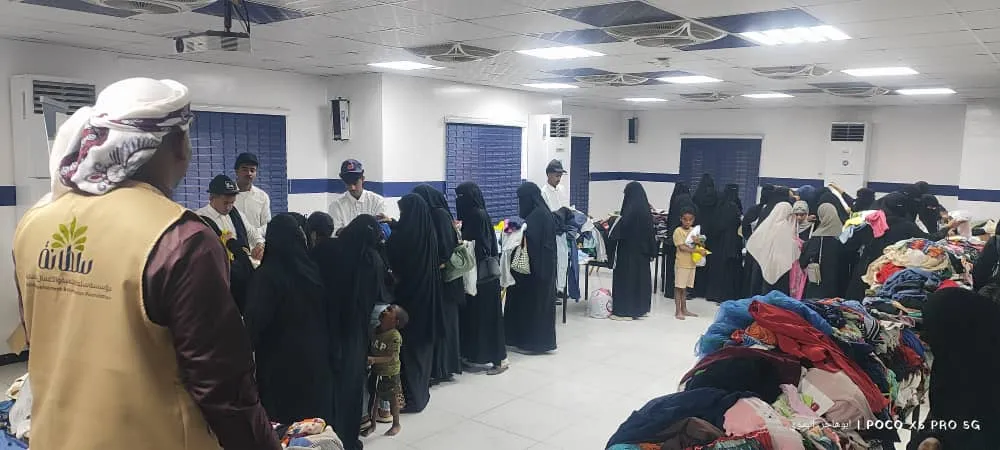 توزيع التمور والملابس وإفطار صائم